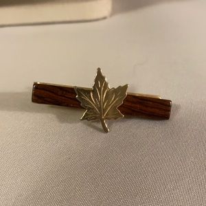 Vintage Goldtone Maple Leaf Tie Clasp on Wood